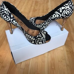 Tan and black peep toe stiletto heel